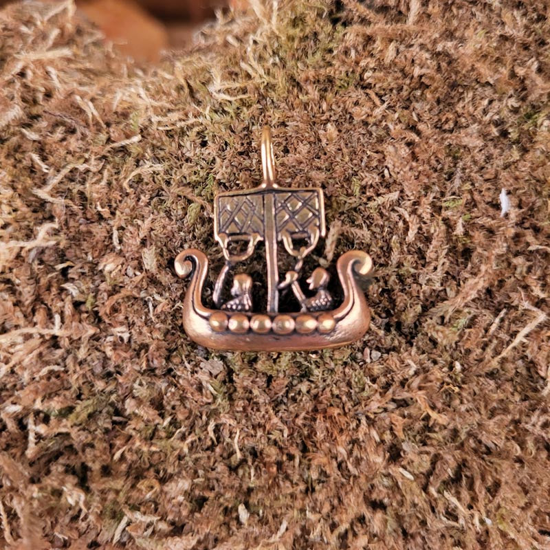 Viking longship amulet in bronze
