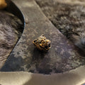 Antike Bronzeperle Löwenkopf