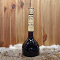 Blaubeerwein in Elixierflasche