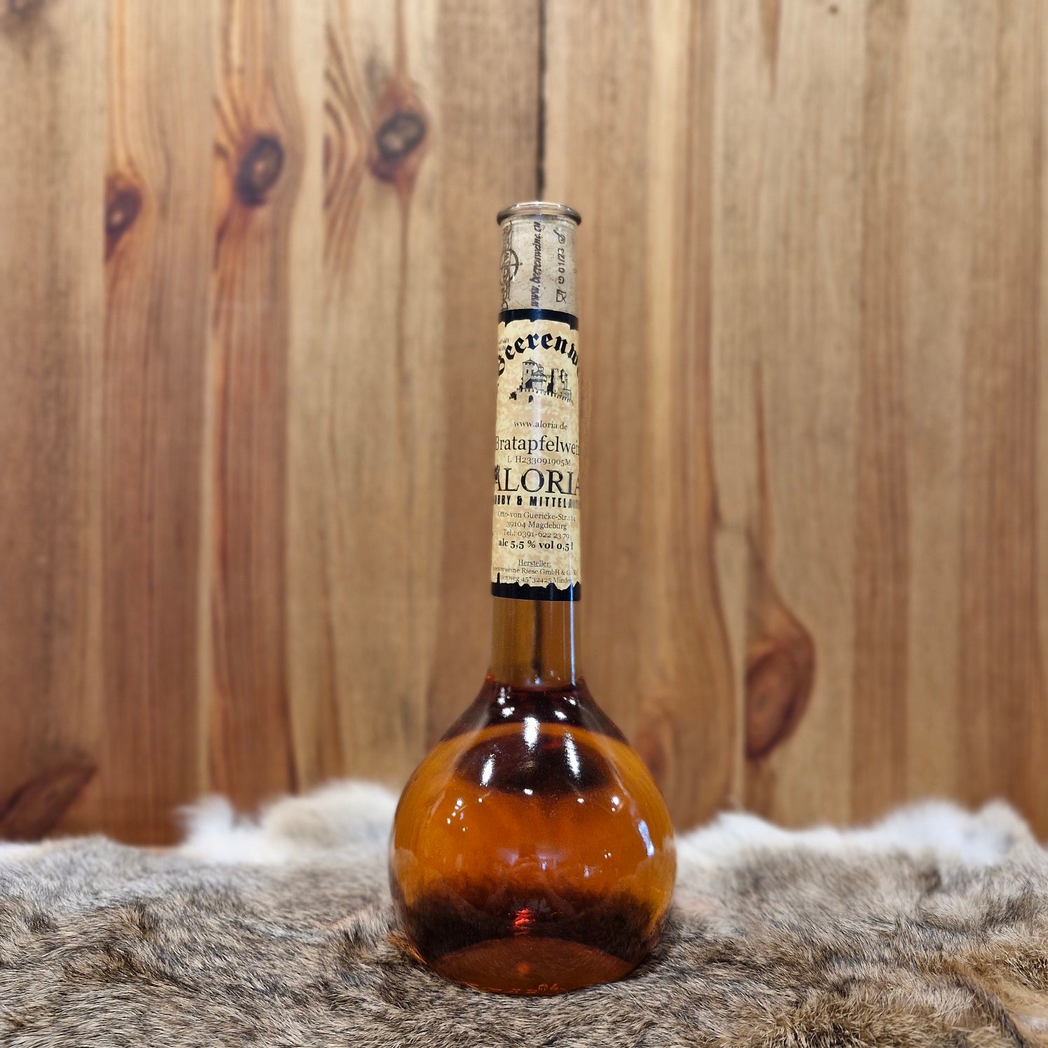 Bratapfelwein in Elixierflasche