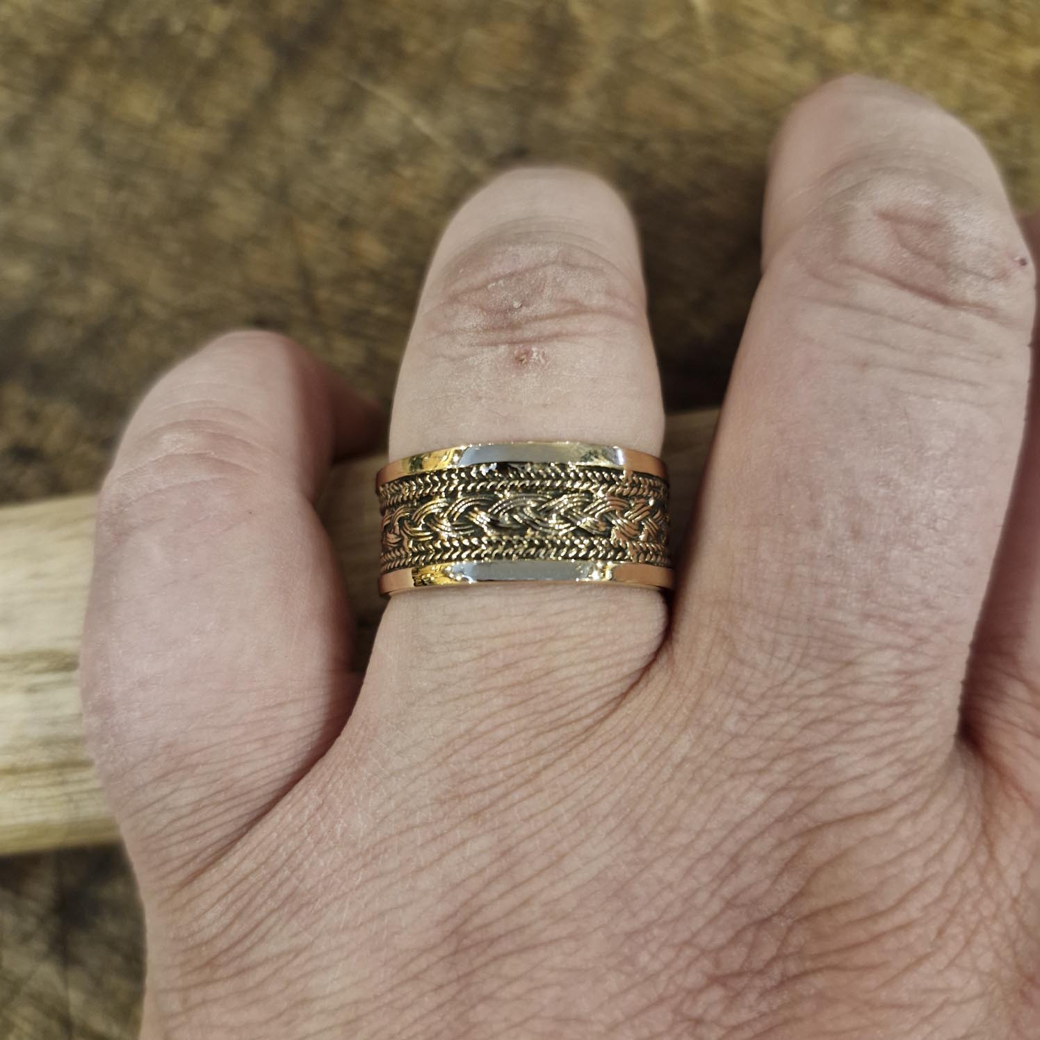 Wide Viking ring with braid pattern made of bronze
