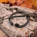Iron fibula with coiled ends - handcrafted