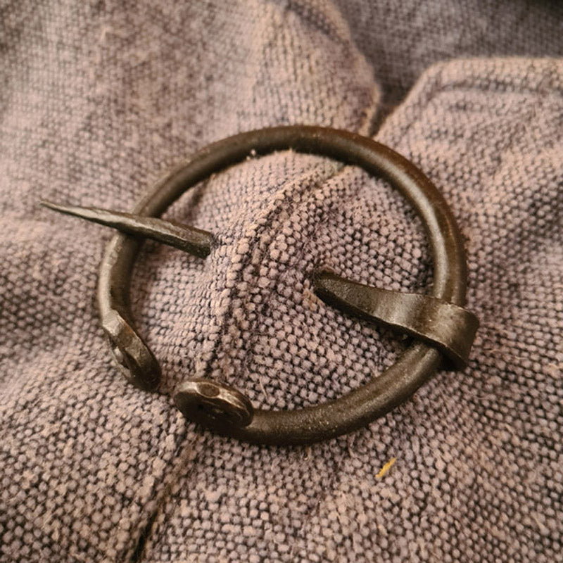 Iron fibula with coiled ends - handcrafted