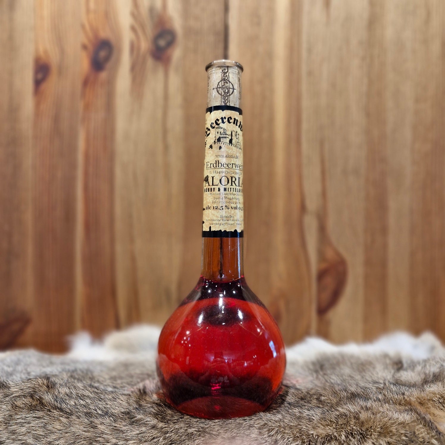 Erdbeerwein in Elixierflasche
