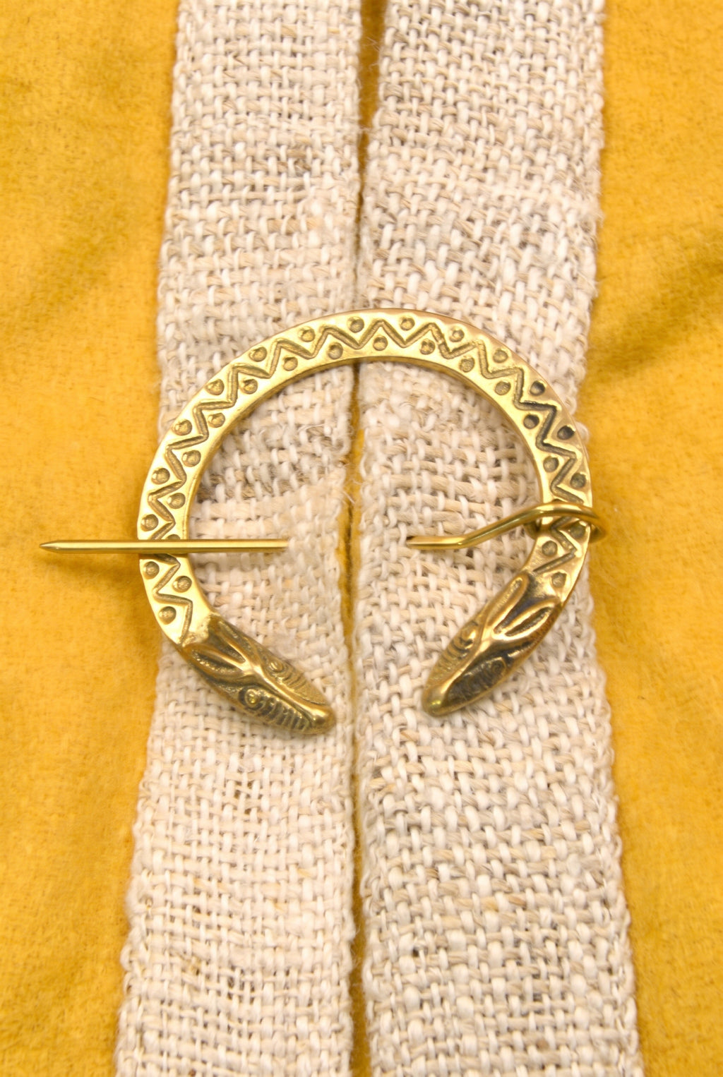 Germanic fibula dragon head made of brass