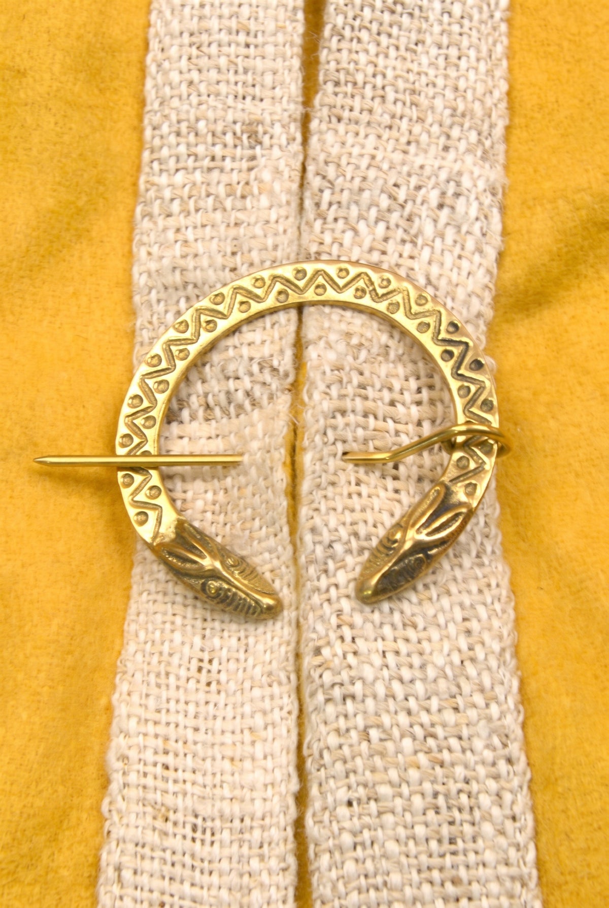 Germanic fibula dragon head made of brass