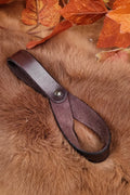 Belt holder for drinking horn made of buffalo leather