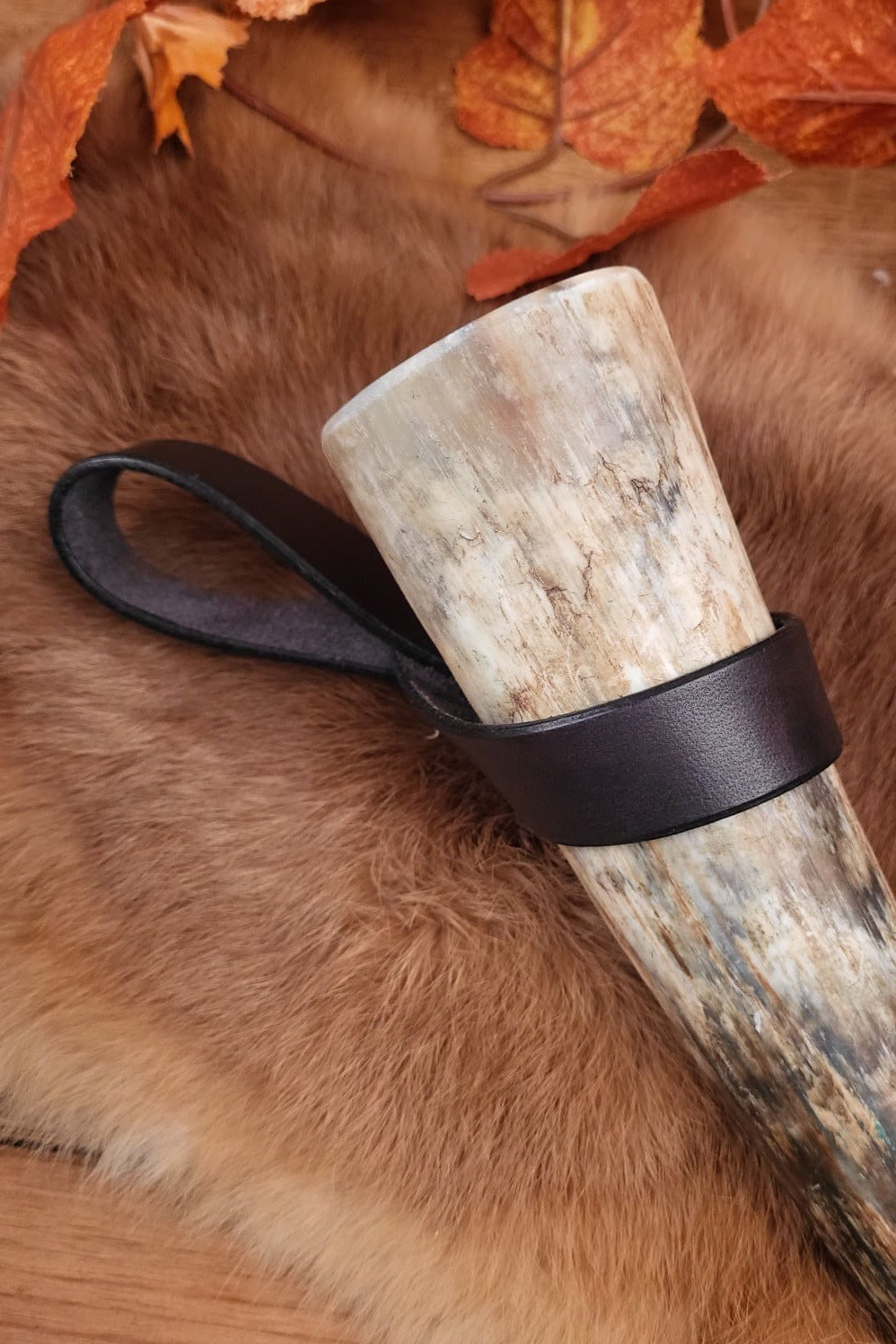 Belt holder for drinking horn made of buffalo leather