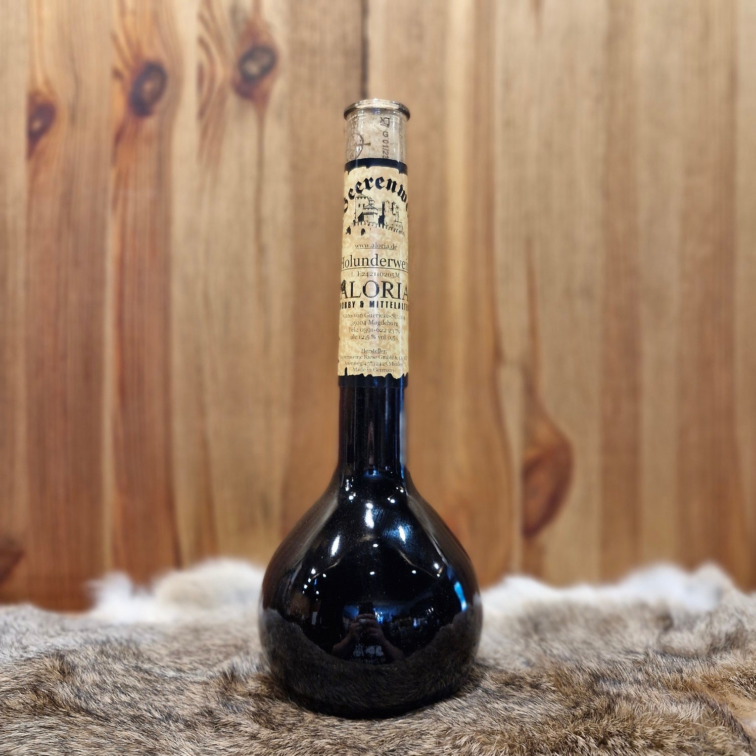 Holunderbeerwein in Elixierflasche