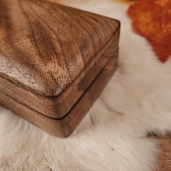 Small wooden chest with hidden clasp