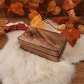 Small wooden chest with hidden clasp