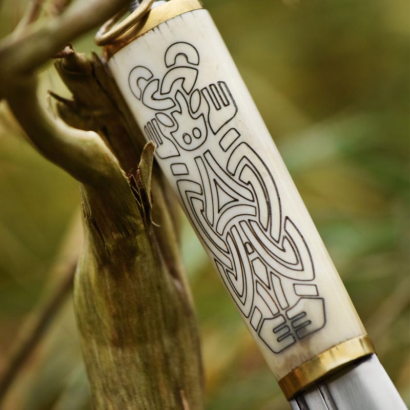 Small Viking seax knife with ornate bone handle in Borre style and leather sheath