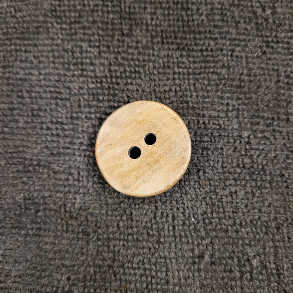 Cow horn button