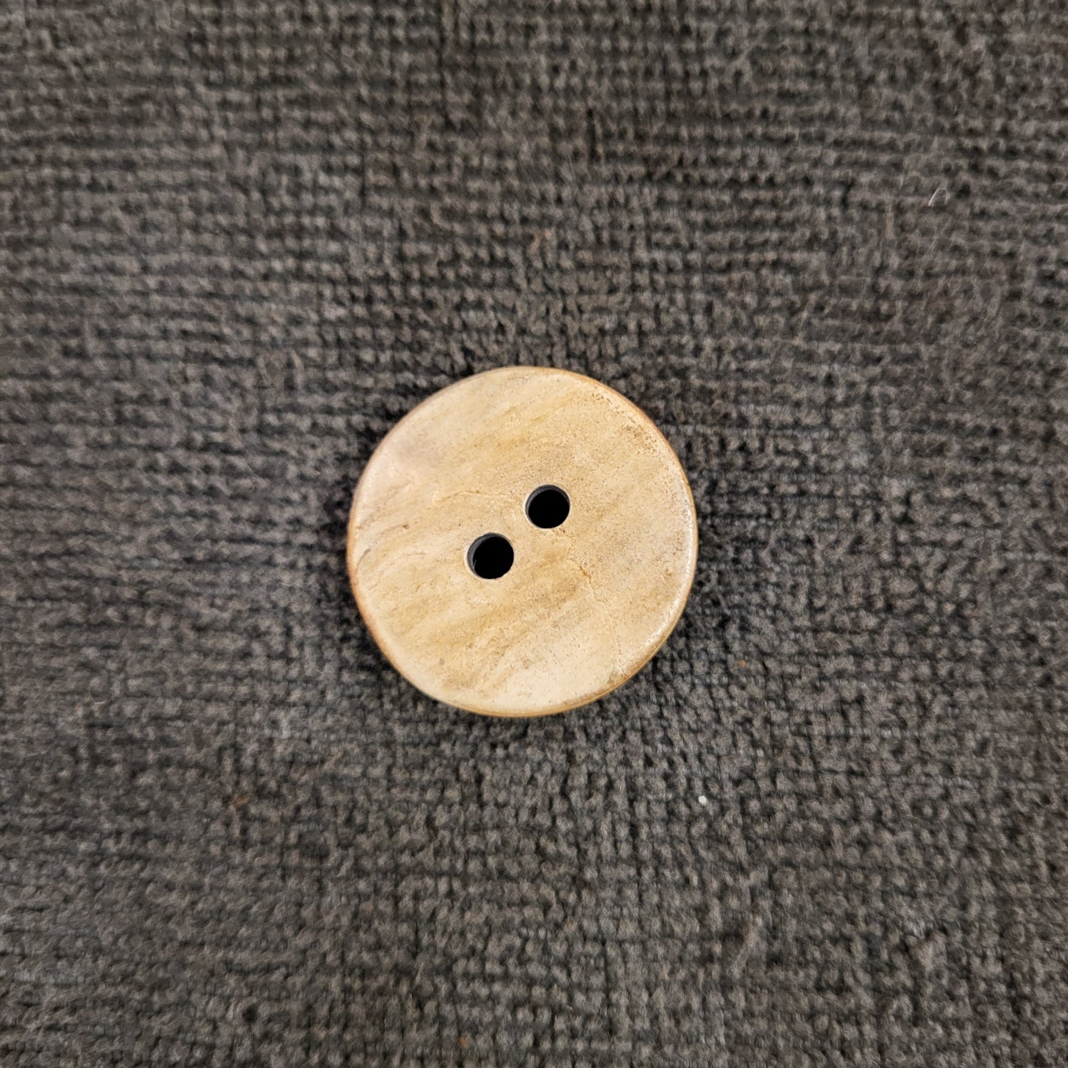 Cow horn button