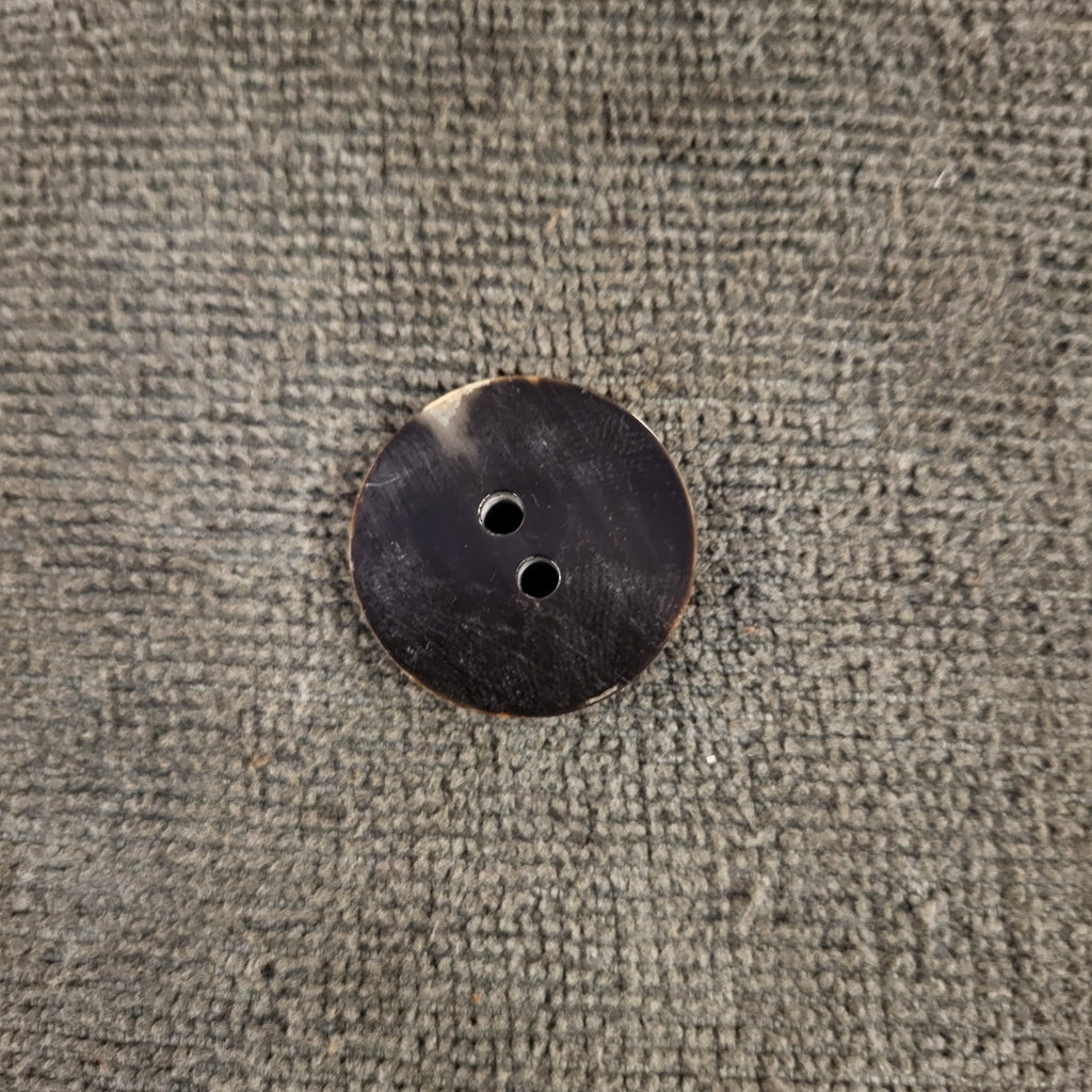 Cow horn button