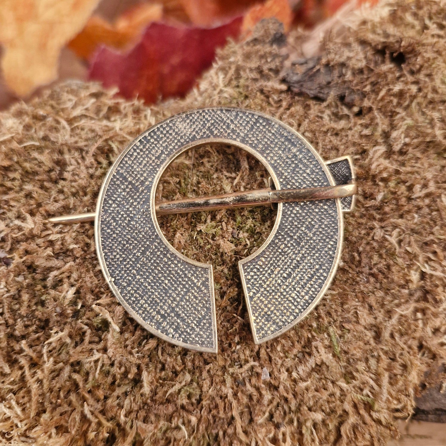 LARP fibula with bronze stones