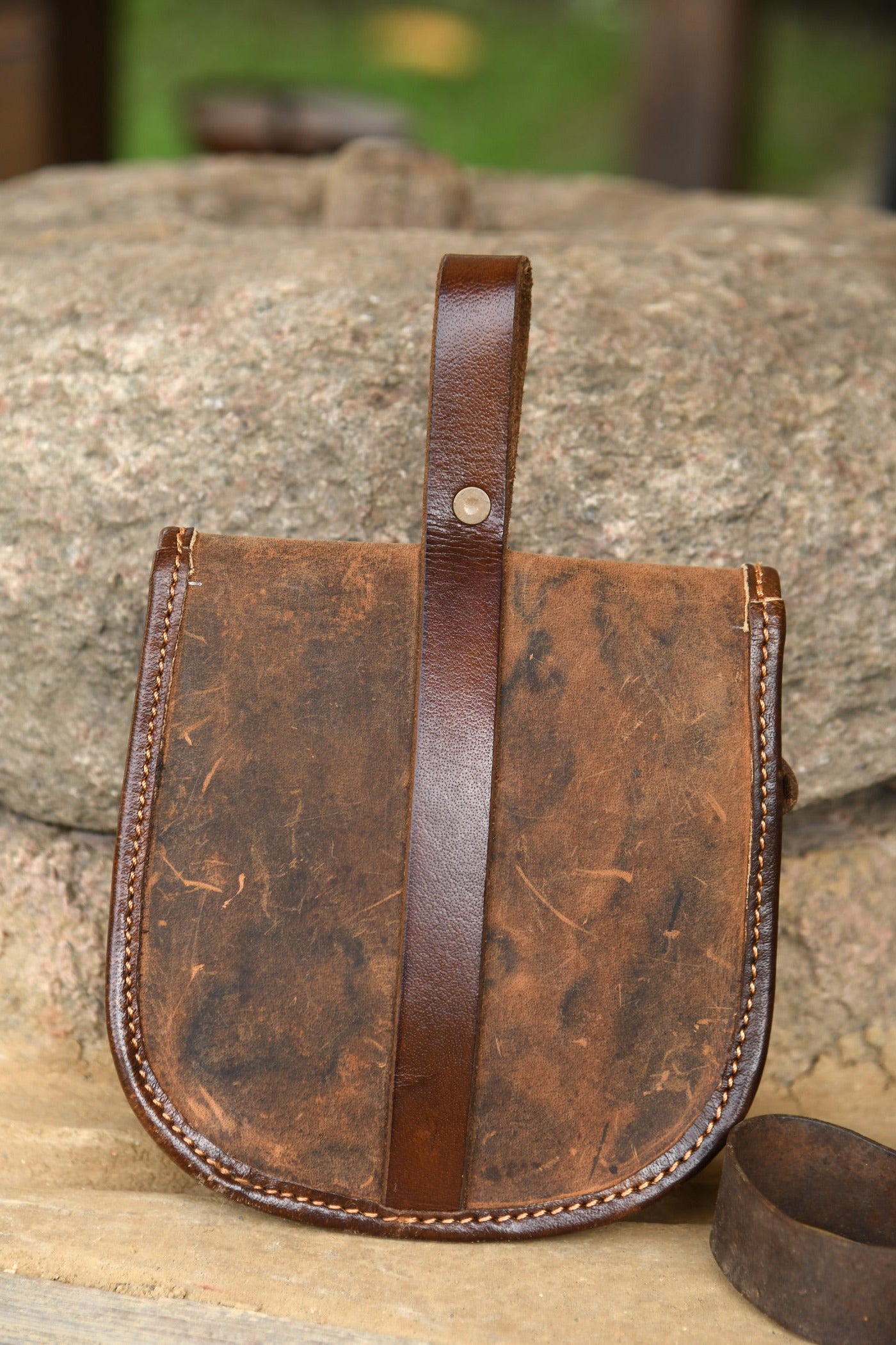 Medieval belt bag made of brown grease leather