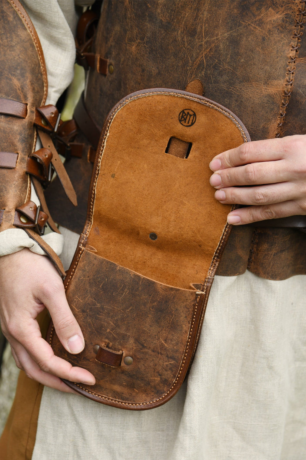 Medieval belt bag made of brown grease leather