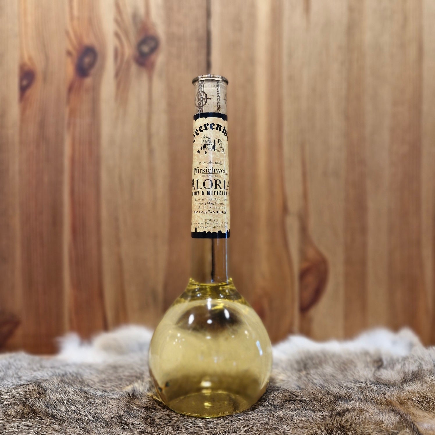 Pfirsichwein in Elixierflasche