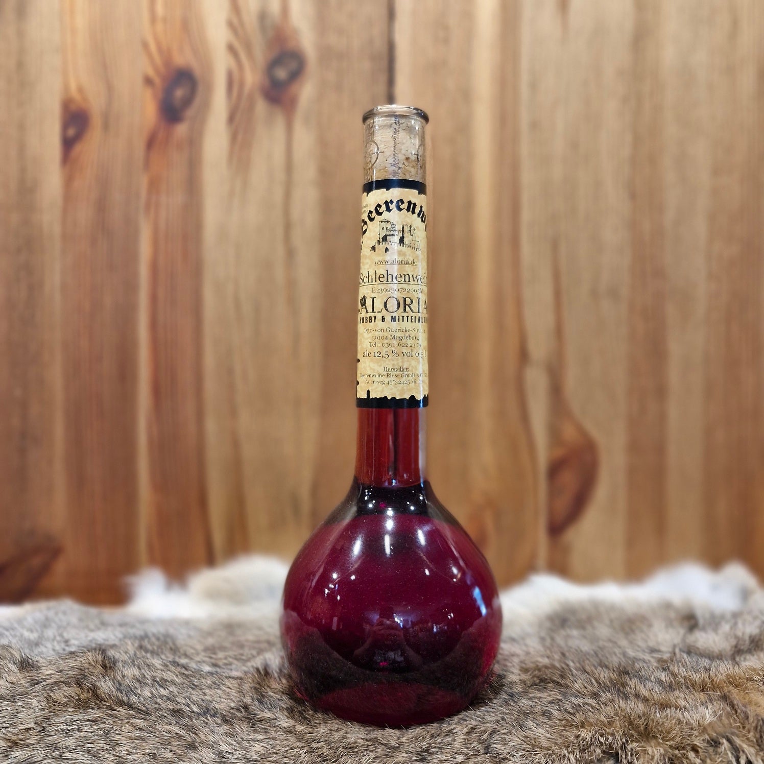 Schlehenwein in Elixierflasche