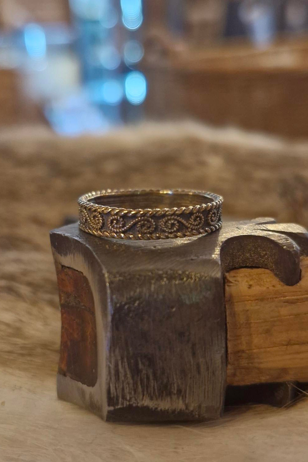 Narrow ring with bronze spirals
