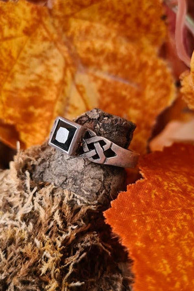 Silver ring with black zircon