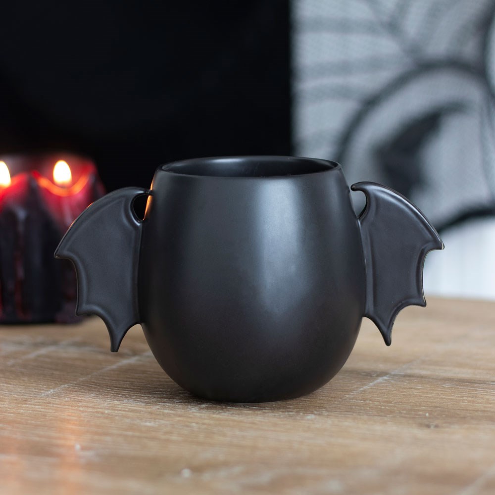 Tasse mit Fledermausflügel