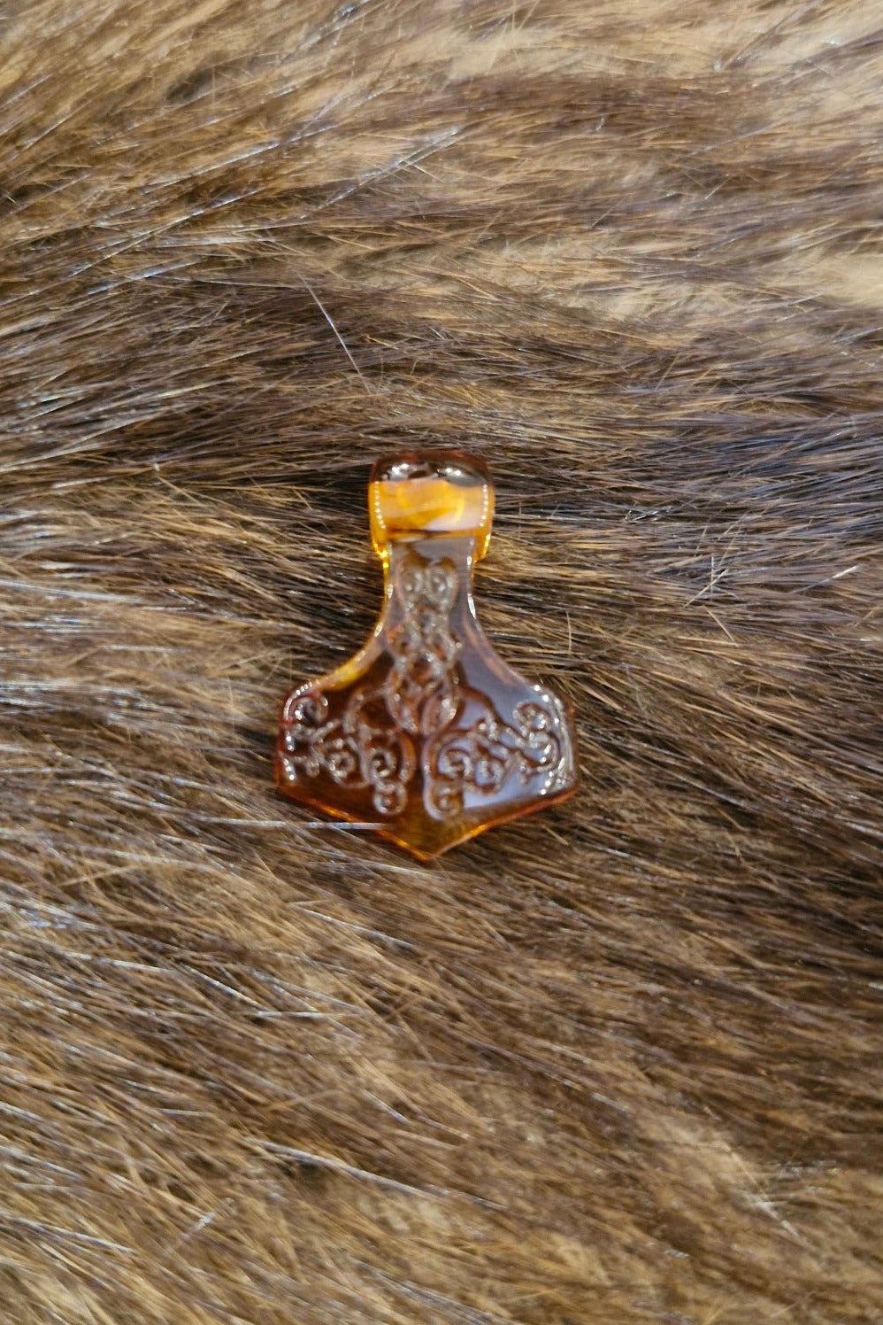Thor's Hammer with amber ornamentation - hand-polished