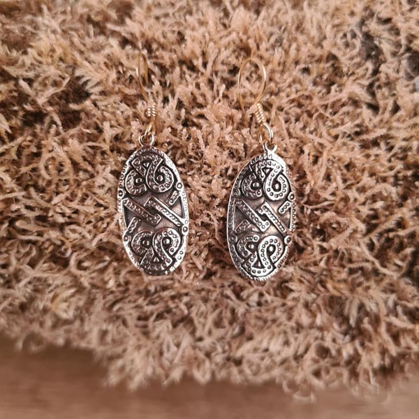 Viking Urnes-style bronze earrings