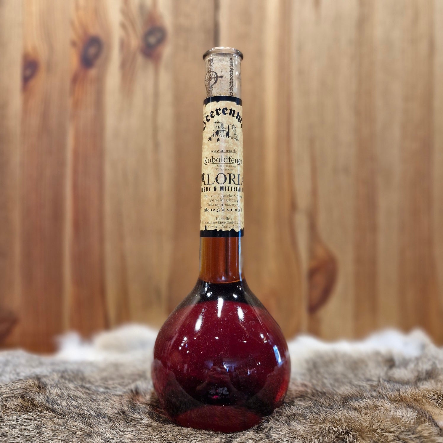 Wildrosenwein - Koboldfeuer in Elixierflasche