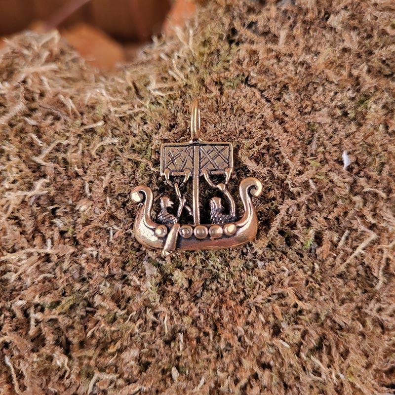 Viking longship amulet in bronze