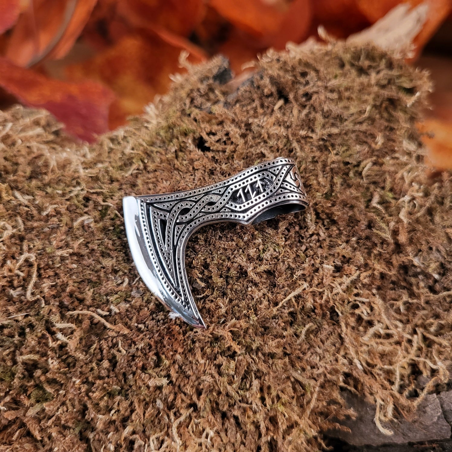 Silver axe amulet
