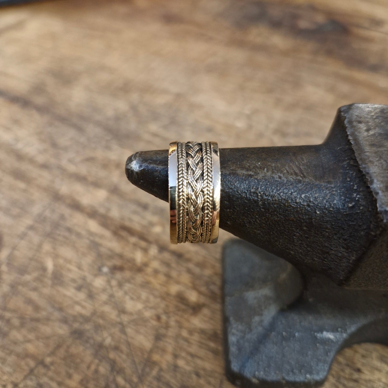 Wide Viking ring with braid pattern made of bronze