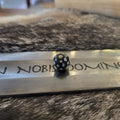 Medieval black glass bead with white dots