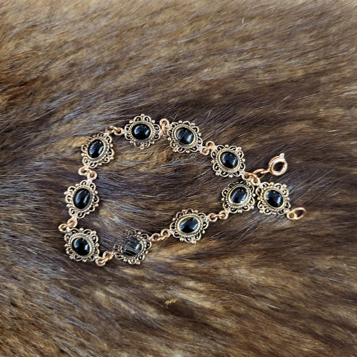 Renaissance Armkette mit Onyx aus Bronze